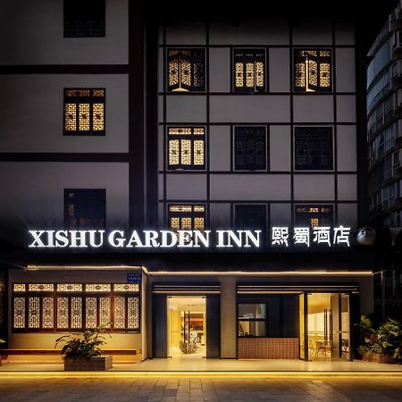 Xishu Garden Inn - Travel Agency Service - Car Rent Service - English Speaking Chengdu Exteriör bild