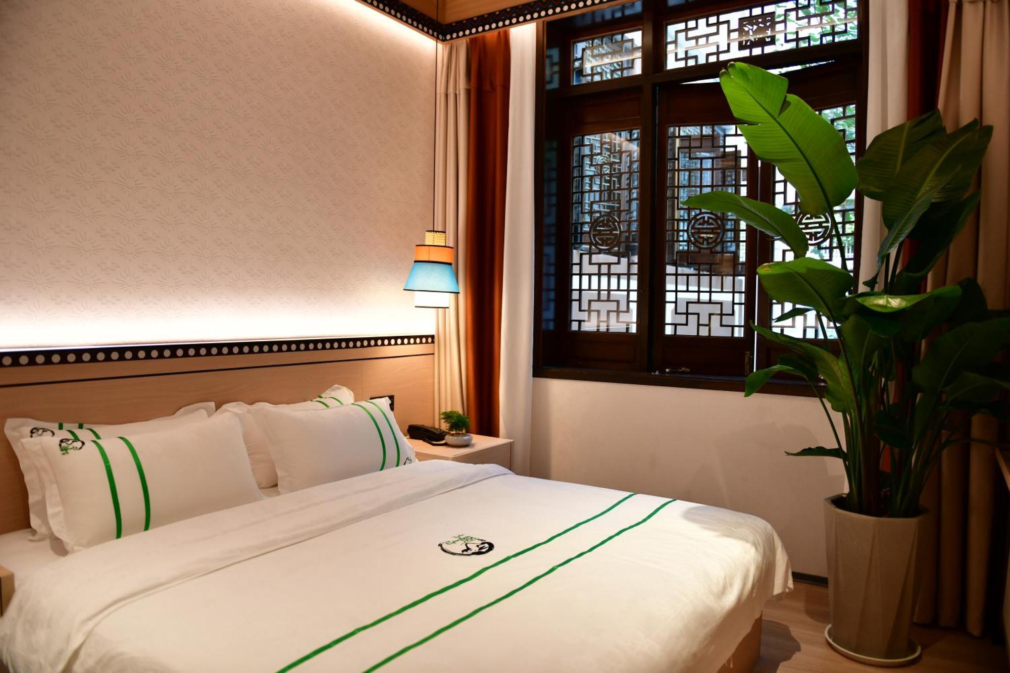 Xishu Garden Inn - Travel Agency Service - Car Rent Service - English Speaking Chengdu Exteriör bild